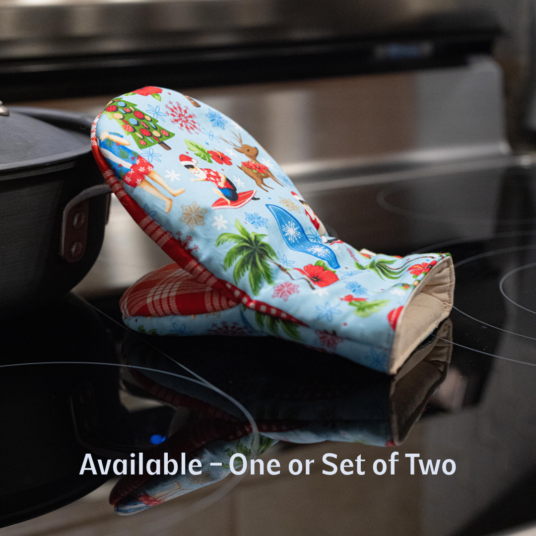 Oven mitt with colorful design on a stovetop